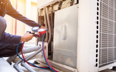 What are signs of air condenser refrigerant leaks?